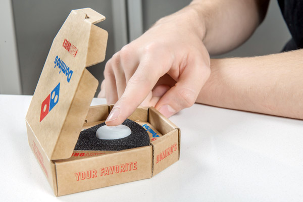 Domino's ontwikkelt een pizzaknop